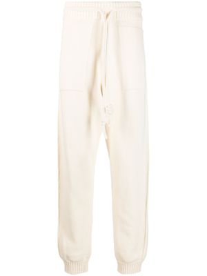 Off-White pantalon de jogging en maille à rayures Diag - Tons neutres