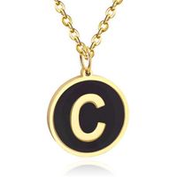 Goudkleurige Dames Schakelketting met Zwarte Kettinghanger Letter C