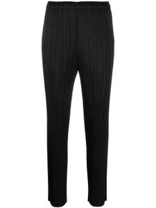 Pleats Please Issey Miyake pantalon fuselé court à design plissé - Noir