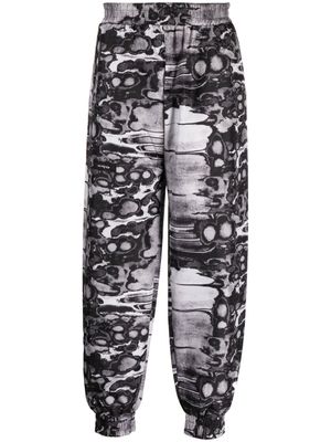 ISO.POETISM pantalon de jogging Khumbu à imprimé abstrait - Noir