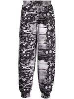 ISO.POETISM pantalon de jogging Khumbu à imprimé abstrait - Noir