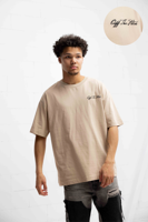 Off The Pitch Script Loose Fit T-Shirt Unisex Beige - Maat XXL - Kleur: Sand | Soccerfanshop