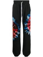 AMIRI pantalon à imprimé tie-dye - Noir