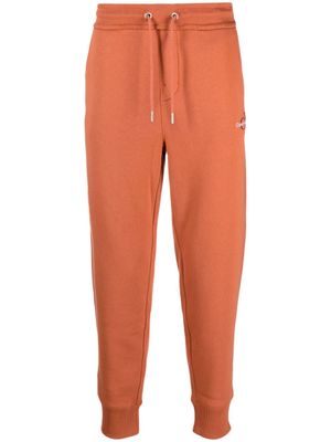Calvin Klein Jeans pantalon de jogging à logo brodé - Orange