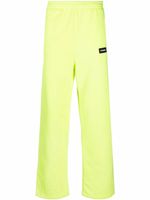 VETEMENTS pantalon de jogging à patch logo - Jaune