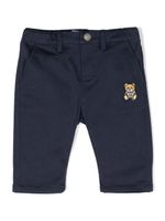 Moschino Kids pantalon rayé à patch ourson - Bleu