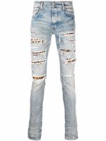 AMIRI jean skinny à taille basse - Bleu