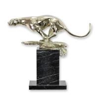 A BRONZE SCULPTURE OF A RUNNING JAGUAR A BRONZE SCULPTURE OF A RUNNING JAGUAR