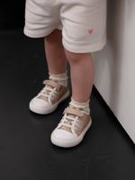 Gebreide en klittenband babymanden goud