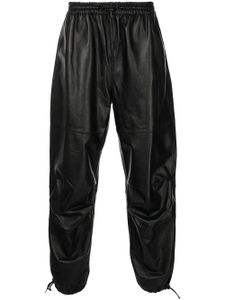 Alexander Wang pantalon de jogging ample en cuir artificiel - Noir