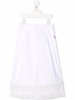 TWINSET Kids pantalon ample à bords effilochés - Blanc