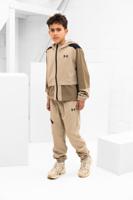 Under Armour Unstoppable Woven Trainingspak Kids Beige - Maat 164 - Kleur: Beige | Soccerfanshop