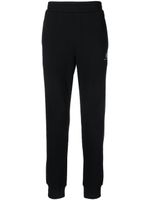 Armani Exchange pantalon de jogging à logo imprimé - Noir