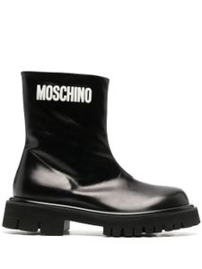 Moschino bottes en cuir zippées à logo embossé - Noir