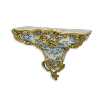 A BRONZE MOUNTED PORCELAIN WALL CONSOLE