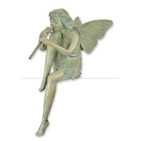 A BRONZE SCULPTURE OF A SEATED FAIRY PLAYING FLUTE A BRONZE SCULPTURE OF A SEATED FAIRY PLAYING FLUTE