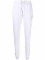 Armani Exchange pantalon de jogging à logo strassé - Blanc