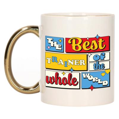 Cadeau koffie/thee mok - de beste trainer/coach - van de wereld - goud - 300 ml - keramiek