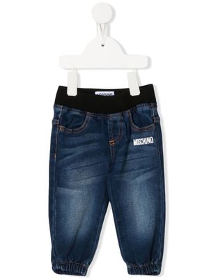 Moschino Kids pantalon en jean à logo imprimé - Bleu