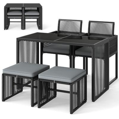 5-Delige PE Rieten Tuinmeubelset Buitenset met Kussens Ruimtebesparende Rotan Tuinstoel en Gehard Glazen Tafel met Voetenbankjes