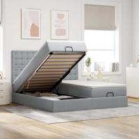 Ottoman bed met matrassen en LED's 180x200cm stof lichtgrijs