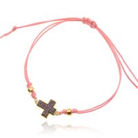 Enkelband van roze touw met goudkleurige kralen en kruis - thumbnail