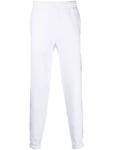 Lacoste pantalon de jogging à bandes logo - Blanc