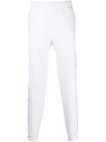 Lacoste pantalon de jogging à bandes logo - Blanc