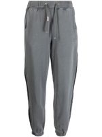 Musium Div. pantalon de jogging à lien de resserrage - Gris