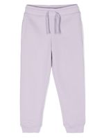 Stella McCartney Kids pantalon de jogging à logo imprimé - Violet