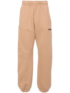 MISBHV pantalon de jogging à logo imprimé - Marron