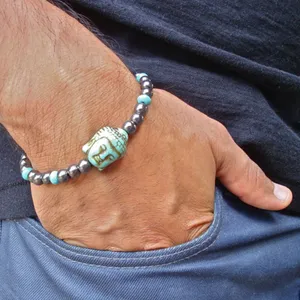 Tibetaanse Boeddha Kralen Armband met Semi Precious Turquoise - Sieraden - Spiritueelboek.nl