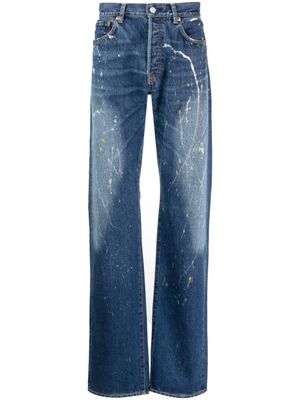 Yohji Yamamoto jean droit à effet taches de peinture - Bleu