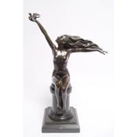 A BRONZE SCULPTURE CALLED THE CARRIER PIGEON
