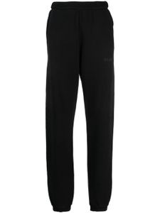 The Attico pantalon de jogging en coton à logo embossé - Noir