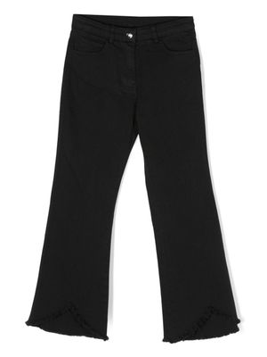 TWINSET Kids jean asymétrique à bords francs - Noir