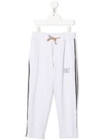 Brunello Cucinelli Kids pantalon de jogging en coton à bandes contrastantes - Blanc