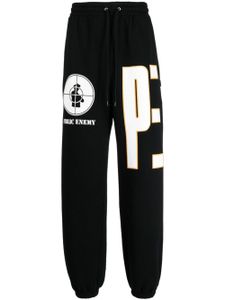 Neighborhood x Public Enemy pantalon de jogging à logo - Noir