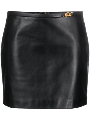 Versace minijupe en cuir à ornements Medusa - Noir