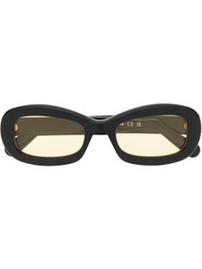 GCDS lunettes de soleil rondes à plaque logo - Noir