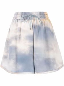 Alexander McQueen short en soie à motif tie-dye - Bleu