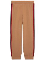 Gucci pantalon de jogging à bandes Web - Marron