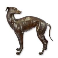 A BRONZE SCULPTURE OF A GREYHOUND