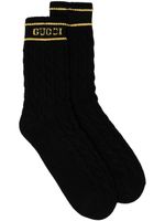 Gucci chaussettes en maille torsadée à logo imprimé - Noir