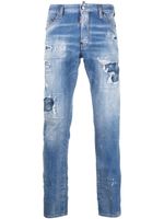 DSQUARED2 jean slim à effet taches de peinture - Bleu