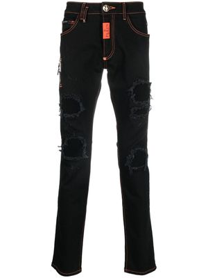 Philipp Plein jean slim à finitions effilochées - Noir