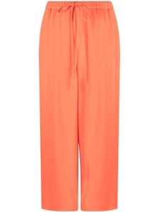 Valentino Garavani pantalon ample à taille nouée - Orange