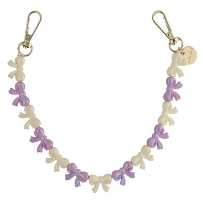 Telefoonkoord Bow - Paars Wit - Goud Telefoonkoord Bow - Paars Wit - Goud