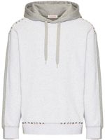 Valentino Garavani hoodie à ornements Rockstud - Gris