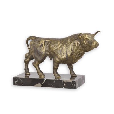 A CAST IRON SCULPTURE OF A BULL ON MARBLE BASE